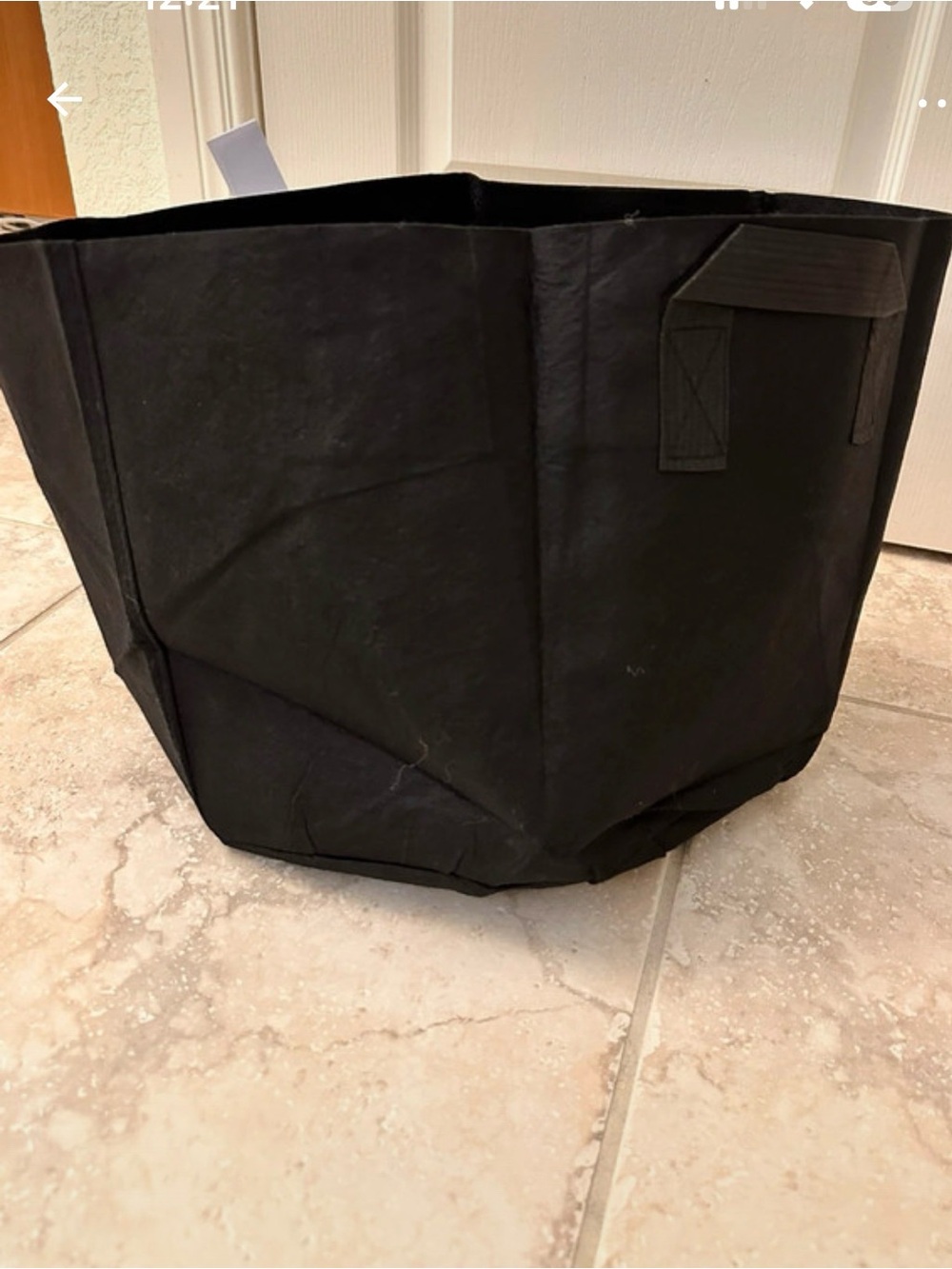 New bundle of 3 round and 2 rectangle black woven fabric planters with handles.